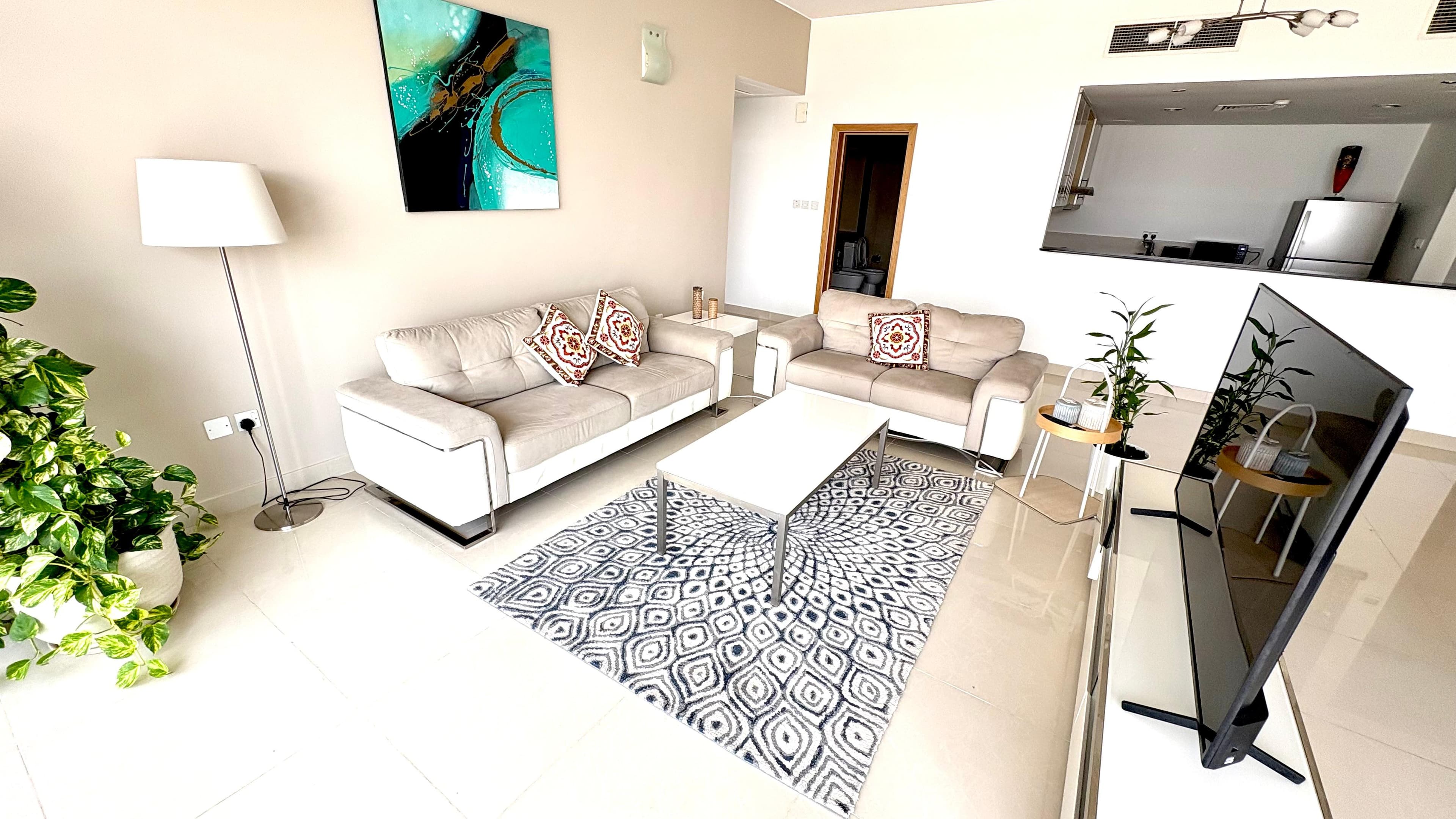 Modern 2BR Apartment | Pool, Gym & Covered Parking